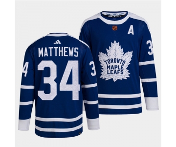 Men's Toronto Maple Leafs Black #34 Auston Matthews Blue 2022 Reverse Retro Stitched Jersey